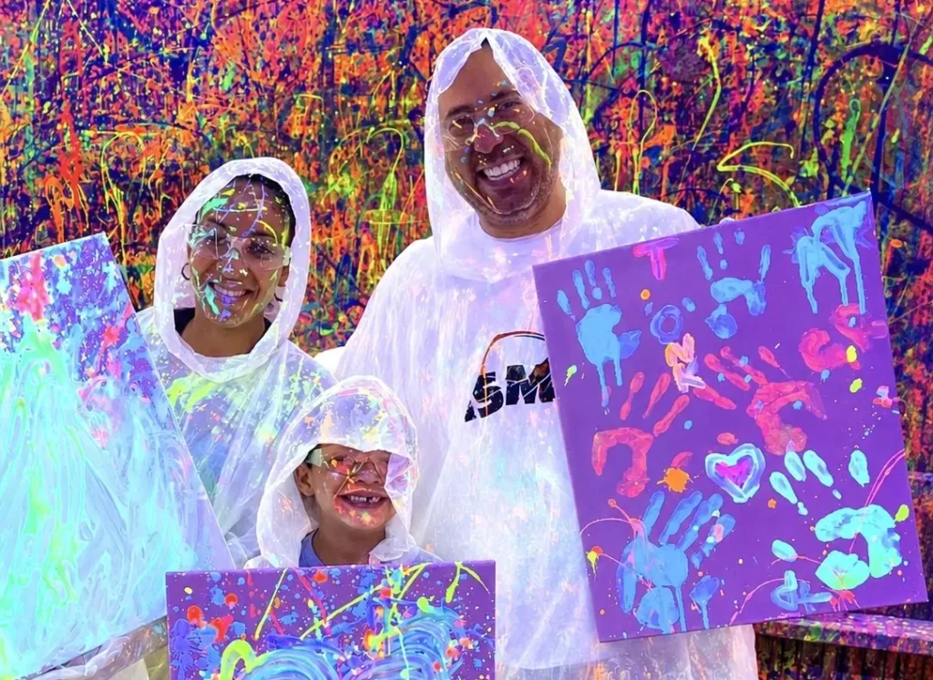 Friends enjoying a paint splatter activity